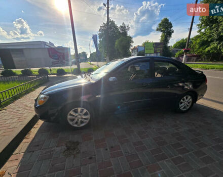 Черный Киа Черато, объемом двигателя 1.6 л и пробегом 232 тыс. км за 4000 $, фото 5 на Automoto.ua