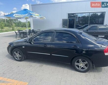 Черный Киа Черато, объемом двигателя 1.6 л и пробегом 160 тыс. км за 3500 $, фото 2 на Automoto.ua