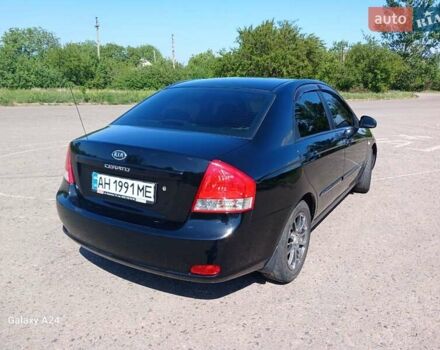 Черный Киа Черато, объемом двигателя 1.6 л и пробегом 225 тыс. км за 5200 $, фото 1 на Automoto.ua