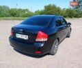 Черный Киа Черато, объемом двигателя 1.6 л и пробегом 225 тыс. км за 5200 $, фото 1 на Automoto.ua