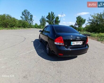 Черный Киа Черато, объемом двигателя 1.6 л и пробегом 225 тыс. км за 5200 $, фото 2 на Automoto.ua