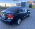 Черный Киа Черато, объемом двигателя 1.59 л и пробегом 166 тыс. км за 4800 $, фото 2 на Automoto.ua