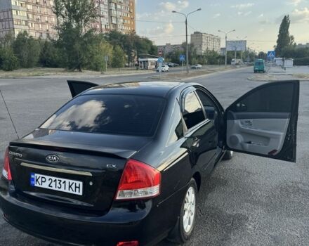 Черный Киа Черато, объемом двигателя 1.6 л и пробегом 156 тыс. км за 5500 $, фото 1 на Automoto.ua