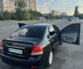 Черный Киа Черато, объемом двигателя 1.6 л и пробегом 156 тыс. км за 5000 $, фото 1 на Automoto.ua
