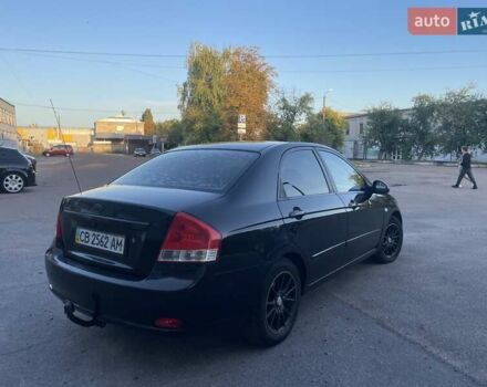 Чорний Кіа Черато, об'ємом двигуна 1.6 л та пробігом 299 тис. км за 4500 $, фото 4 на Automoto.ua