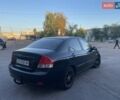 Чорний Кіа Черато, об'ємом двигуна 1.6 л та пробігом 299 тис. км за 4500 $, фото 4 на Automoto.ua