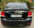 Черный Киа Черато, объемом двигателя 2 л и пробегом 173 тыс. км за 4800 $, фото 4 на Automoto.ua