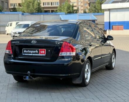 Черный Киа Черато, объемом двигателя 1.6 л и пробегом 239 тыс. км за 5990 $, фото 5 на Automoto.ua