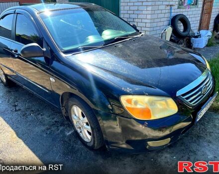 Черный Киа Черато, объемом двигателя 1.6 л и пробегом 300 тыс. км за 3000 $, фото 4 на Automoto.ua