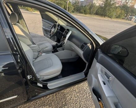 Черный Киа Черато, объемом двигателя 1.6 л и пробегом 156 тыс. км за 5500 $, фото 16 на Automoto.ua