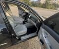 Черный Киа Черато, объемом двигателя 1.6 л и пробегом 156 тыс. км за 5000 $, фото 16 на Automoto.ua