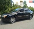 Чорний Кіа Черато, об'ємом двигуна 1.6 л та пробігом 200 тис. км за 4500 $, фото 4 на Automoto.ua