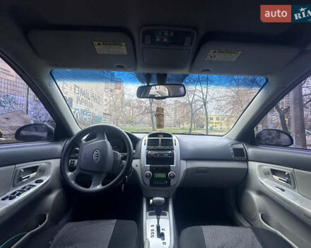 Черный Киа Черато, объемом двигателя 2 л и пробегом 220 тыс. км за 3400 $, фото 4 на Automoto.ua