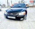Чорний Кіа Черато, об'ємом двигуна 1.6 л та пробігом 205 тис. км за 5200 $, фото 2 на Automoto.ua
