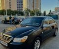 Чорний Кіа Черато, об'ємом двигуна 1.6 л та пробігом 253 тис. км за 3915 $, фото 1 на Automoto.ua
