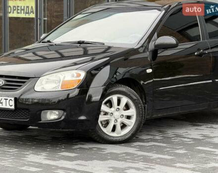 Черный Киа Черато, объемом двигателя 1.98 л и пробегом 180 тыс. км за 5500 $, фото 1 на Automoto.ua