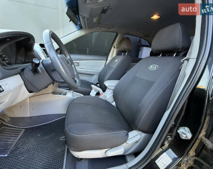 Черный Киа Черато, объемом двигателя 1.98 л и пробегом 180 тыс. км за 5750 $, фото 38 на Automoto.ua