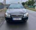 Чорний Кіа Черато, об'ємом двигуна 1.6 л та пробігом 254 тис. км за 3194 $, фото 1 на Automoto.ua