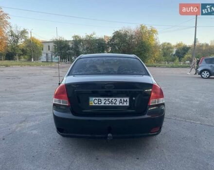Чорний Кіа Черато, об'ємом двигуна 1.6 л та пробігом 299 тис. км за 4500 $, фото 3 на Automoto.ua