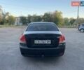 Чорний Кіа Черато, об'ємом двигуна 1.6 л та пробігом 299 тис. км за 4500 $, фото 3 на Automoto.ua