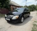 Чорний Кіа Черато, об'ємом двигуна 1.6 л та пробігом 180 тис. км за 4300 $, фото 1 на Automoto.ua