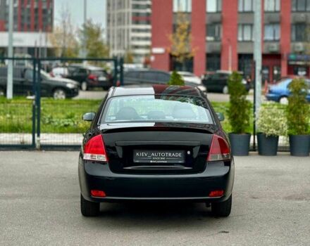 Чорний Кіа Черато, об'ємом двигуна 2 л та пробігом 270 тис. км за 4000 $, фото 5 на Automoto.ua