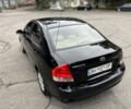 Черный Киа Черато, объемом двигателя 1.6 л и пробегом 205 тыс. км за 3900 $, фото 7 на Automoto.ua