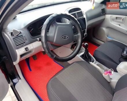 Чорний Кіа Черато, об'ємом двигуна 1.6 л та пробігом 335 тис. км за 5500 $, фото 11 на Automoto.ua