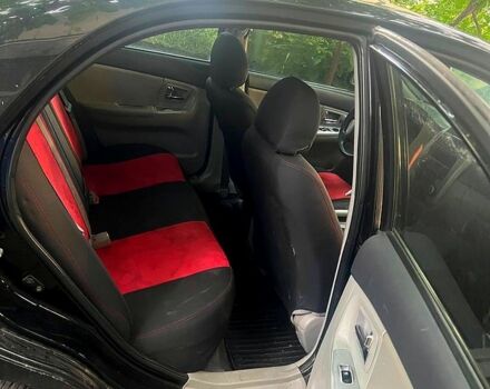 Чорний Кіа Черато, об'ємом двигуна 1.6 л та пробігом 330 тис. км за 2700 $, фото 5 на Automoto.ua