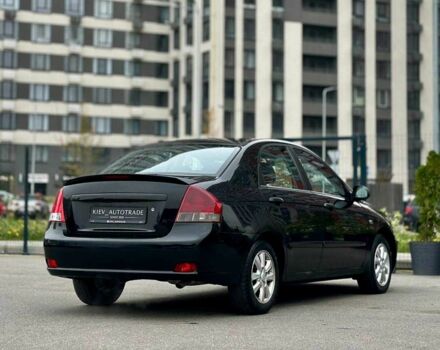 Чорний Кіа Черато, об'ємом двигуна 2 л та пробігом 270 тис. км за 4000 $, фото 2 на Automoto.ua