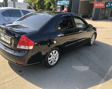 Чорний Кіа Черато, об'ємом двигуна 1.6 л та пробігом 260 тис. км за 4700 $, фото 8 на Automoto.ua