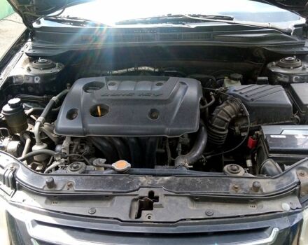 Черный Киа Черато, объемом двигателя 1.6 л и пробегом 297 тыс. км за 3500 $, фото 3 на Automoto.ua