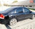 Чорний Кіа Черато, об'ємом двигуна 1.6 л та пробігом 335 тис. км за 5500 $, фото 7 на Automoto.ua
