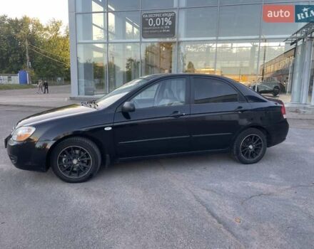 Чорний Кіа Черато, об'ємом двигуна 1.6 л та пробігом 299 тис. км за 4500 $, фото 1 на Automoto.ua