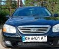 Черный Киа Черато, объемом двигателя 1.6 л и пробегом 178 тыс. км за 5500 $, фото 1 на Automoto.ua