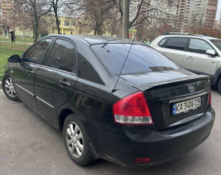 Черный Киа Черато, объемом двигателя 2 л и пробегом 220 тыс. км за 3400 $, фото 2 на Automoto.ua