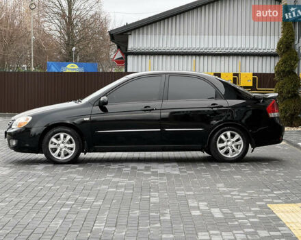 Черный Киа Черато, объемом двигателя 1.98 л и пробегом 180 тыс. км за 5500 $, фото 7 на Automoto.ua