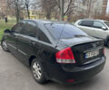Черный Киа Черато, объемом двигателя 2 л и пробегом 220 тыс. км за 3400 $, фото 2 на Automoto.ua