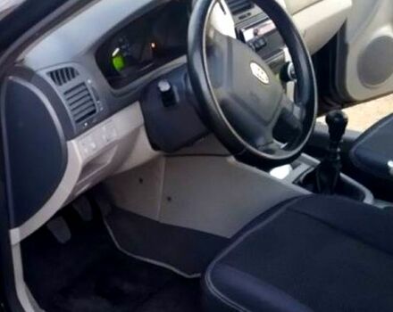 Черный Киа Черато, объемом двигателя 1.6 л и пробегом 272 тыс. км за 4700 $, фото 3 на Automoto.ua