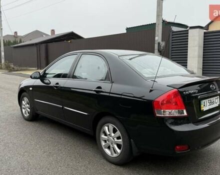 Черный Киа Черато, объемом двигателя 2 л и пробегом 186 тыс. км за 4999 $, фото 1 на Automoto.ua