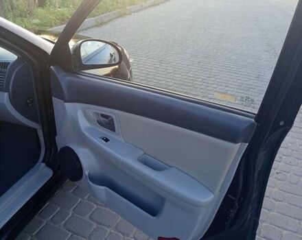 Чорний Кіа Черато, об'ємом двигуна 1.6 л та пробігом 232 тис. км за 4250 $, фото 14 на Automoto.ua