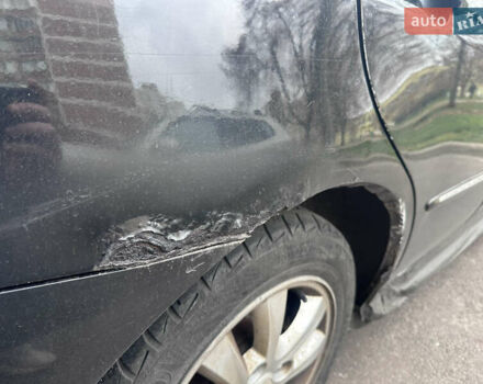 Черный Киа Черато, объемом двигателя 2 л и пробегом 220 тыс. км за 3400 $, фото 12 на Automoto.ua