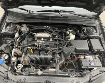 Черный Киа Черато, объемом двигателя 0.16 л и пробегом 250 тыс. км за 3450 $, фото 12 на Automoto.ua