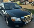 Черный Киа Черато, объемом двигателя 2 л и пробегом 220 тыс. км за 4446 $, фото 1 на Automoto.ua