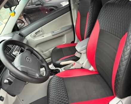 Черный Киа Черато, объемом двигателя 1.6 л и пробегом 258 тыс. км за 5200 $, фото 7 на Automoto.ua