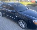 Черный Киа Черато, объемом двигателя 1.59 л и пробегом 166 тыс. км за 4800 $, фото 8 на Automoto.ua
