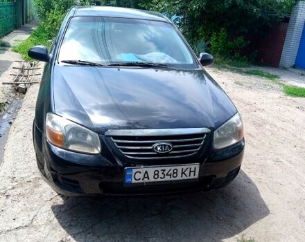 Черный Киа Черато, объемом двигателя 1.6 л и пробегом 297 тыс. км за 3500 $, фото 2 на Automoto.ua