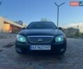 Черный Киа Черато, объемом двигателя 1.58 л и пробегом 193 тыс. км за 4500 $, фото 1 на Automoto.ua