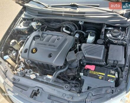 Черный Киа Черато, объемом двигателя 1.6 л и пробегом 225 тыс. км за 5200 $, фото 7 на Automoto.ua