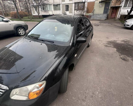 Черный Киа Черато, объемом двигателя 2 л и пробегом 220 тыс. км за 3400 $, фото 1 на Automoto.ua